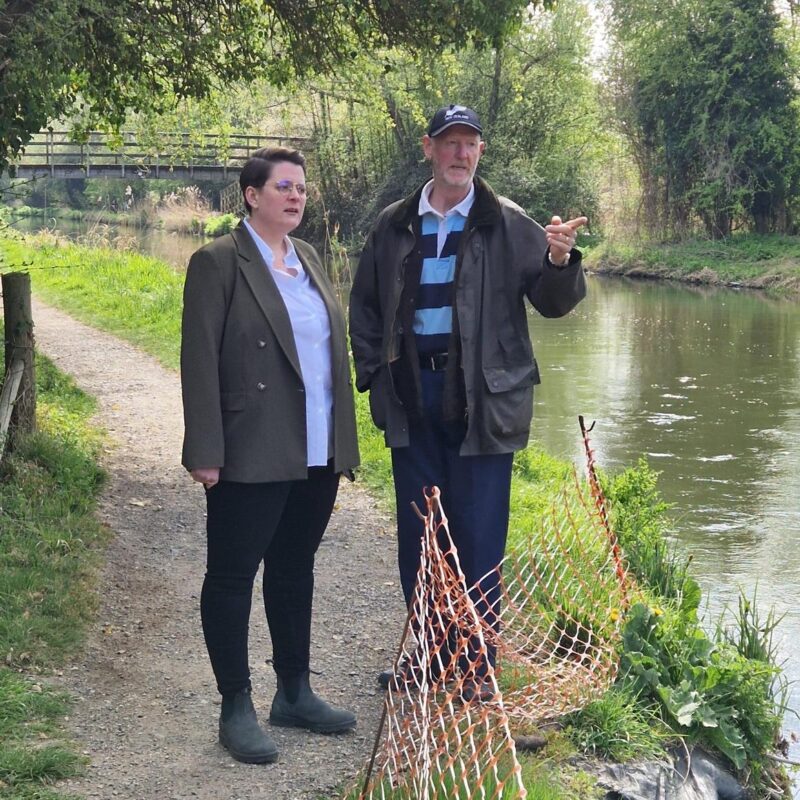 Olivia meeting with a local resident in Burghfield Bridge to discuss flooding